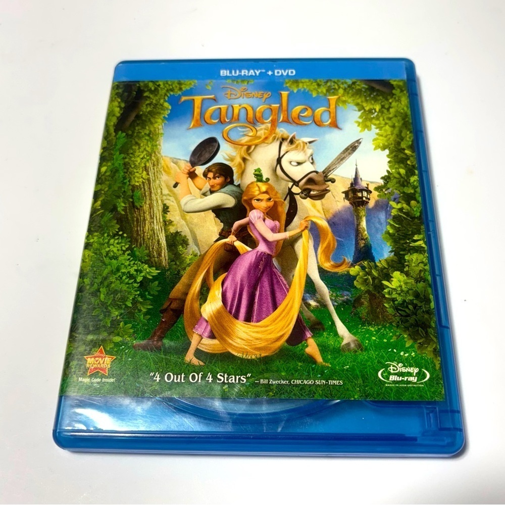 Tangled DVD ONLY! Blu-ray and DVD case of Disney's animated movie "Tangled".